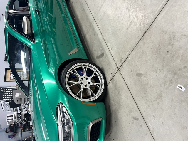 BMW in a mint colour-change wrap